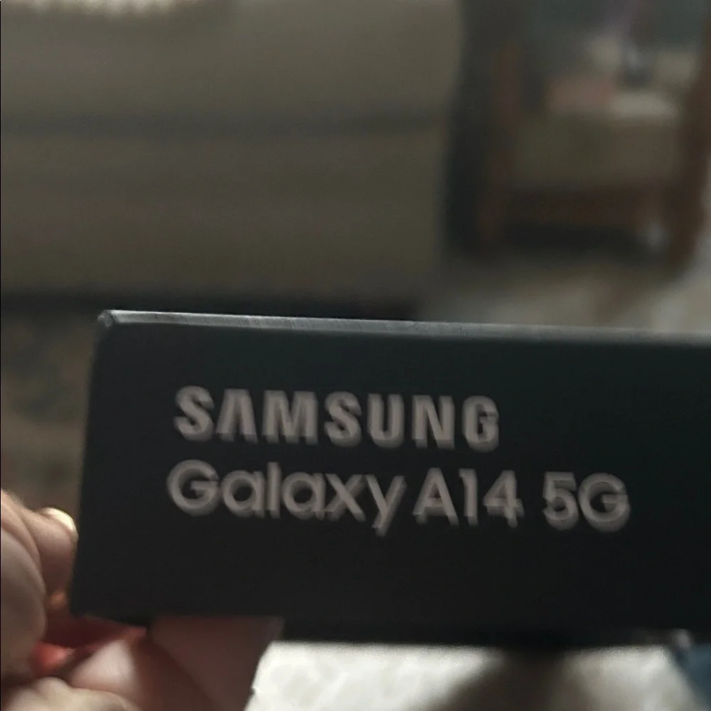 Samsung Galaxy A14 5G in Classic Black used as a home phone only new condition.